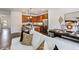 Open concept living room with comfortable seating and kitchen view at 265 Sweetbay Tree Dr, Wendell, NC 27591