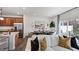 Open concept living room with dining area and kitchen view at 265 Sweetbay Tree Dr, Wendell, NC 27591