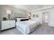 Large main bedroom with gray carpet, a spacious bed, and an ensuite bathroom at 265 Sweetbay Tree Dr, Wendell, NC 27591