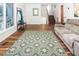 Spacious living room with hardwood floors, comfortable seating, and ample natural light at 326 W Bywood Dr, Durham, NC 27712