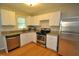 Bright kitchen with stainless steel appliances and granite countertops at 326 Webster St, Cary, NC 27511