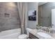 Bathroom with tub, shower, granite countertop, and a modern vanity at 334 Arcadius Dr, Clayton, NC 27520