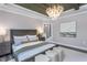 Spacious main bedroom with hardwood floors and a large window at 334 Arcadius Dr, Clayton, NC 27520