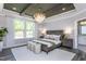 Spacious main bedroom with hardwood floors and a large window at 334 Arcadius Dr, Clayton, NC 27520