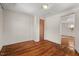Simple bedroom with hardwood floors and ample closet space at 3817 Booker Ave, Durham, NC 27713