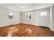 Spacious living room featuring hardwood floors and ample natural light at 3817 Booker Ave, Durham, NC 27713