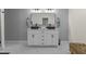 Modern bathroom with double vanity and a large mirror at 420 Nelson St, Durham, NC 27707