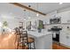 Modern kitchen with stainless steel appliances and a large island at 420 Nelson St, Durham, NC 27707