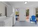 Laundry room with washer, dryer, and access to deck at 420 Nelson St, Durham, NC 27707