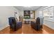 Spacious living room with hardwood floors, fireplace, and comfortable seating at 420 Nelson St, Durham, NC 27707