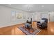 Relaxing living room featuring hardwood floors and bay windows at 420 Nelson St, Durham, NC 27707