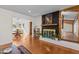 Living room boasts a fireplace, hardwood floors and an open floorplan at 420 Nelson St, Durham, NC 27707