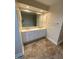 Bathroom boasts double sinks, ample storage, and tiled floors at 446 Crossvine Close, Pittsboro, NC 27312
