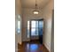 Bright entryway with hardwood floors and access to backyard at 446 Crossvine Close, Pittsboro, NC 27312