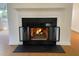 Elegant fireplace with gas logs at 446 Crossvine Close, Pittsboro, NC 27312