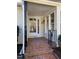 Front entry with brick steps, a white door and black railings at 446 Crossvine Close, Pittsboro, NC 27312