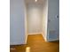 Clean and bright hallway with hardwood floors at 446 Crossvine Close, Pittsboro, NC 27312