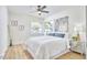 Bright bedroom with hardwood floors and a comfortable bed at 713 Hudson Ave, Durham, NC 27704