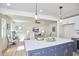 Modern kitchen island with white countertops and blue cabinets at 713 Hudson Ave, Durham, NC 27704