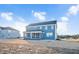 Two-story house, blue exterior, screened porch at 7723 Barefoot Rd, Fuquay Varina, NC 27526