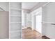 Spacious walk-in closet with ample shelving and hanging space at 7723 Barefoot Rd, Fuquay Varina, NC 27526