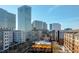 Aerial perspective showcasing a vibrant city neighborhood with high-rises and a restaurant at 802 Tyrrell Rd, Raleigh, NC 27609