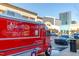 Red Carriage House coffee truck parked in front of shops at 802 Tyrrell Rd, Raleigh, NC 27609