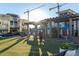 Outdoor plaza area with seating, landscaping, and people at 802 Tyrrell Rd, Raleigh, NC 27609