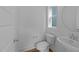 This bathroom features a modern sink and toilet at 930 Allen Pk Dr, Raleigh, NC 27604