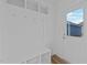 Mudroom with a built-in bench, storage cubbies, coat hooks, and a door leading to the outside at 930 Allen Pk Dr, Raleigh, NC 27604