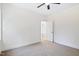 Spacious bedroom features neutral carpet, a ceiling fan, and an open doorway at 0 Cedar Grove Church Rd Rd, Roxboro, NC 27574