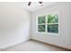 Comfortable bedroom features soft carpeting and a large window overlooking a green yard at 0 Cedar Grove Church Rd Rd, Roxboro, NC 27574