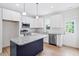 Modern kitchen featuring stainless steel appliances, gray countertops and white cabinets at 0 Cedar Grove Church Rd Rd, Roxboro, NC 27574