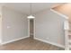 Simple dining room with hardwood floors and pendant lighting at 0 Theresia Ln, Roxboro, NC 27574