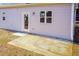 Rear view of house showing patio and exterior door at 0 Theresia Ln, Roxboro, NC 27574