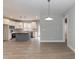 Modern kitchen featuring island, stainless steel appliances, and white cabinets at 0 Theresia Ln, Roxboro, NC 27574