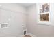 Laundry room with shelving, window, and hookups at 0 Theresia Ln, Roxboro, NC 27574