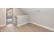 Spacious loft area with hardwood floors and access to bedroom at 0 Theresia Ln, Roxboro, NC 27574