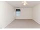 Spacious bedroom with neutral carpet and a large window providing ample natural light at 1000 W Landing Dr, Sanford, NC 27330