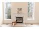 Close-up of a fireplace framed by large windows at 1000 W Landing Dr, Sanford, NC 27330