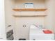 Laundry area with shelving and washer and dryer at 1000 W Landing Dr, Sanford, NC 27330
