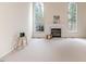 Spacious living room featuring a fireplace and large windows for natural light at 1000 W Landing Dr, Sanford, NC 27330