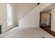 View of the living room with large windows and adjacent hallway at 1000 W Landing Dr, Sanford, NC 27330