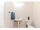 Powder room with pedestal sink and toilet at 1000 W Landing Dr, Sanford, NC 27330