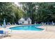 Inviting community pool with plenty of lounge chairs at 102 Wightman Ct, Cary, NC 27511