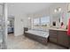 Main bathroom features a soaking tub and dual vanities at 117 Hinshaw Shop Rd, Liberty, NC 27298
