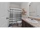 Small bathroom with shower and storage at 117 Hinshaw Shop Rd, Liberty, NC 27298