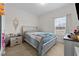 Cozy bedroom with a double bed and window at 117 Hinshaw Shop Rd, Liberty, NC 27298
