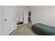 Small bedroom with twin bed and access to bathroom at 117 Hinshaw Shop Rd, Liberty, NC 27298