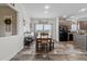 Bright dining room with wood table and bench seating at 117 Hinshaw Shop Rd, Liberty, NC 27298